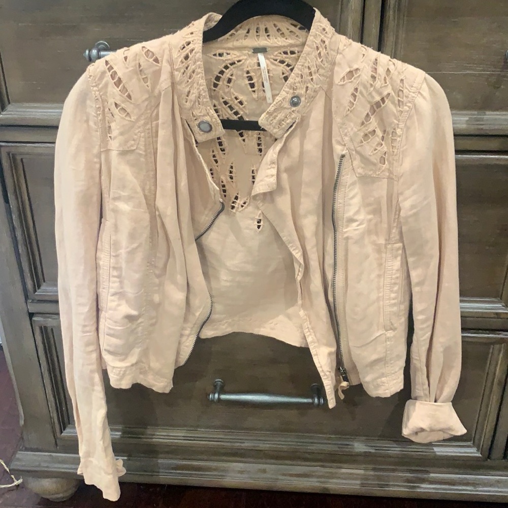 Free people light pink/beige jacket with detailed cut outs on the top